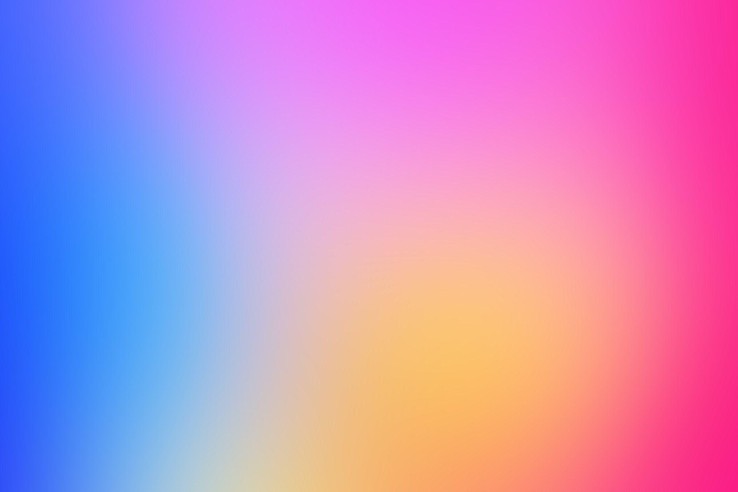 Colourful blurred purple, yellow and blue gradient background.